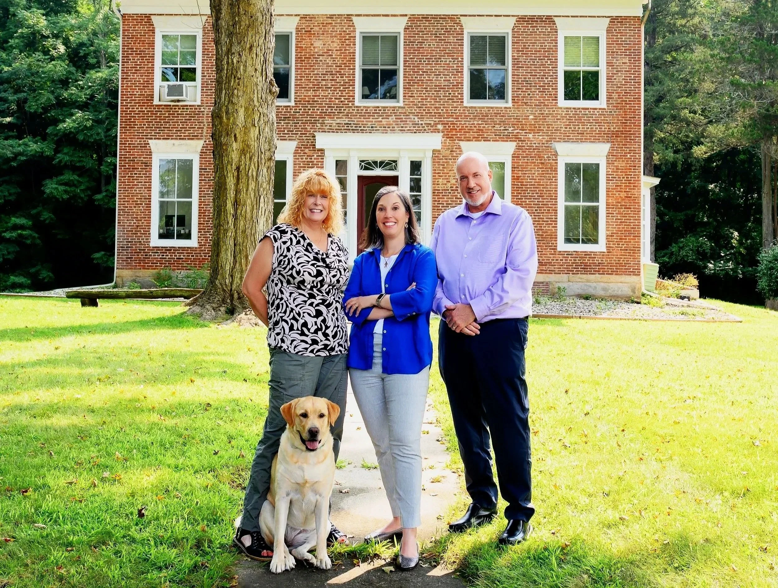 Guendelsberger+Law+Office+Staff+out+on+the+lawn+in+front+of+their+office+building